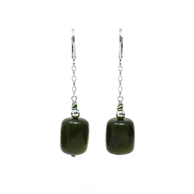 Lever-back earrings by Debra Nelson. Cylindrical BC jade beads with small, round silver and BC jade beads on top hang on silver chains. 2" long including hook, 0.5” wide.