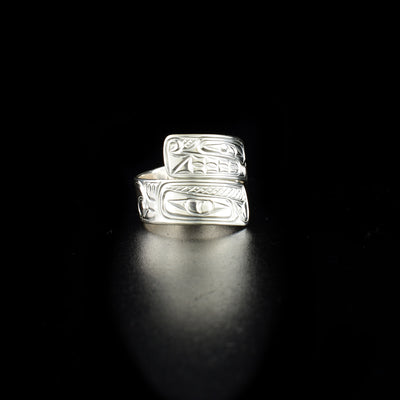 Eagle and wolf wrap ring hand-carved by Coast Salish and Cree artist Richard Lang. Made of sterling silver. Width of band is 0.31". Size 10.5.