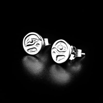 Mini eagle cast studs handcrafted by Kwakwaka'wakw artist Carrie Matilpi. Made of sterling silver. Each earring measures approximately 0.25" in diameter.
