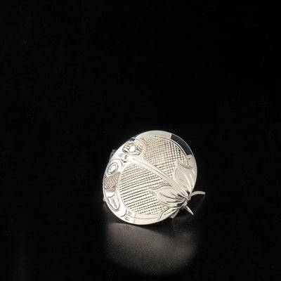 Sterling silver round hummingbird pin/pendant hand-carved by Kwakwaka'wakw artist Harold Alfred. 1.5" in diameter. Hidden bail on back.