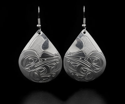 Elegant teardrop hummingbird earrings hand-carved by Kwakwaka'wakw artist Don Lancaster. Made of sterling silver. Each earring measures 2" x 1.2" including hook.