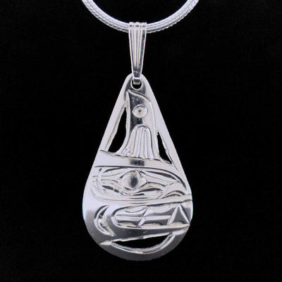 Unique teardrop orca pendant hand carved by Kwakwaka'wakw artist Harold Alfred. Made of sterling silver. Pendant measures 1" long and 0.5" wide. Chain not included. The Orca Legend Represents: LONGEVITY, PROTECTION, FAMILY