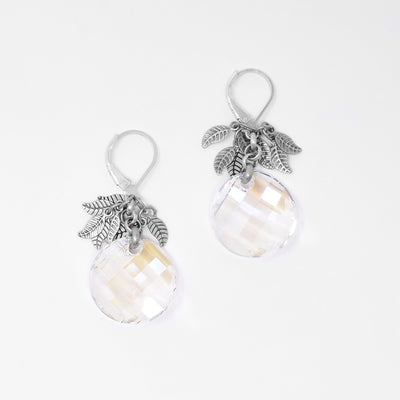 Swarovski Crystal with Antique Silver Leaves Earrings hand-crafted by artist Karley Smith. Sterling silver ear hooks. Each earring measures 1.50" x 0.75" including hook.