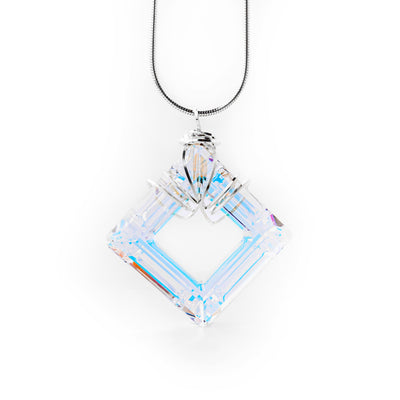 Wire-Wrapped Aurora Borealis Square Pendant handcrafted by artist Debra Nelson. Made of sterling silver and Aurora Borealis Swarovski Crystal. Pendant measures 1.88" x 1.50" including bail. Chain is not included.
