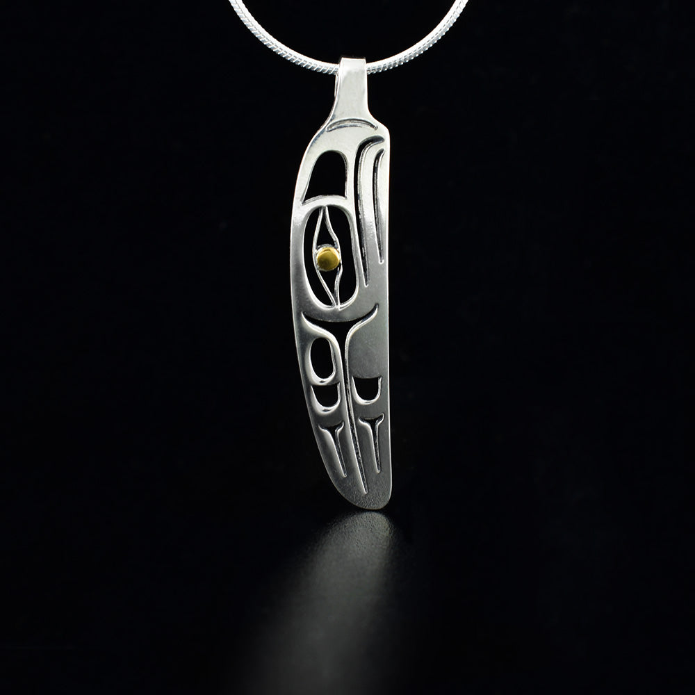 Silver Eagle Feather pendant with gold eye made by Canadian First Nation artist Grant Pauls.