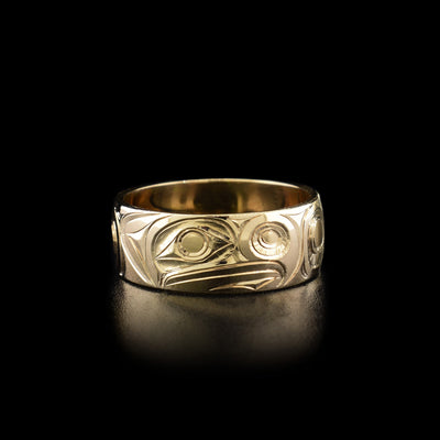 This eagle ring has the profile of an eagle's head facing the right carved in the center of the ring.