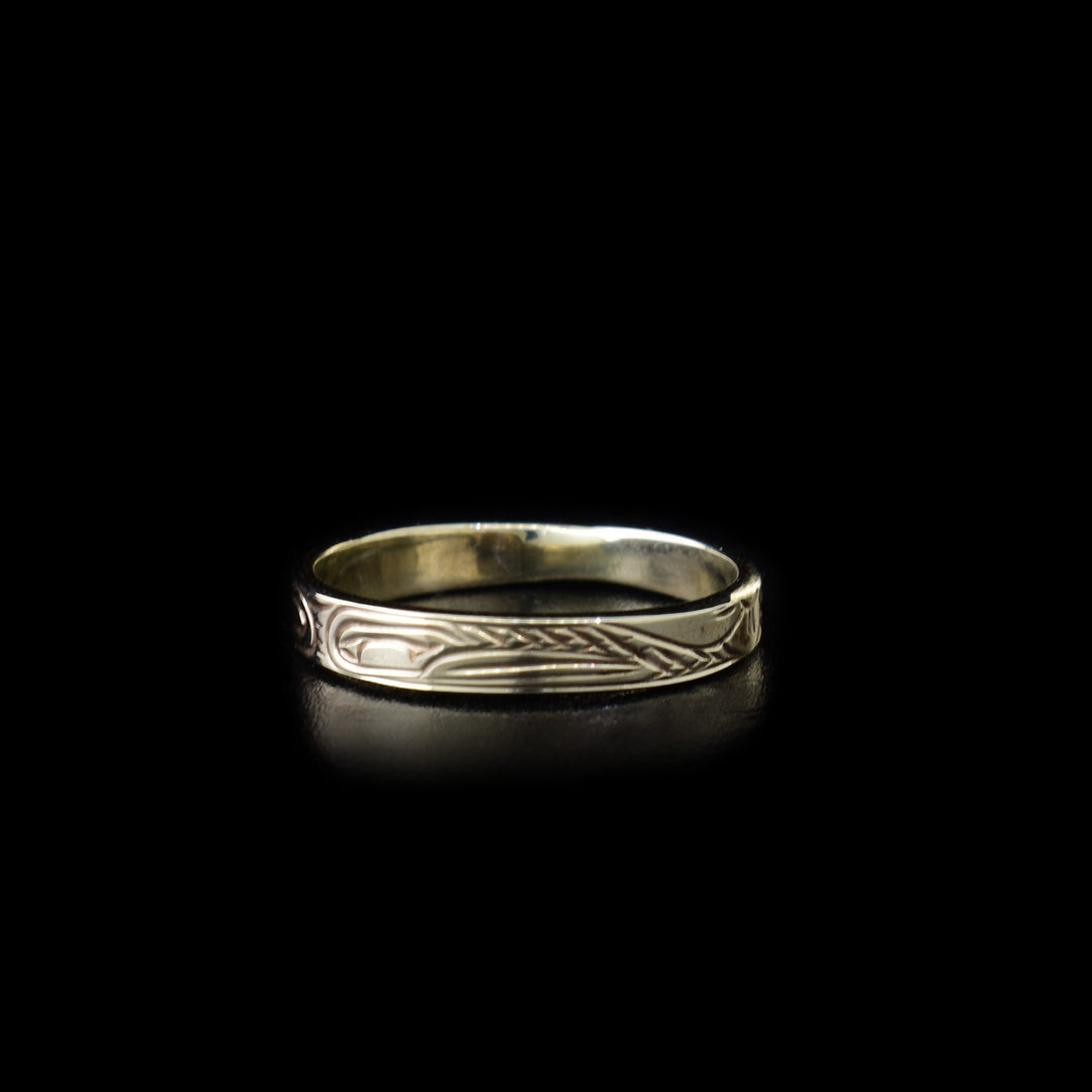 This Hummingbird white gold ring is a single band with a depiction of the Hummingbird carved into the surface.