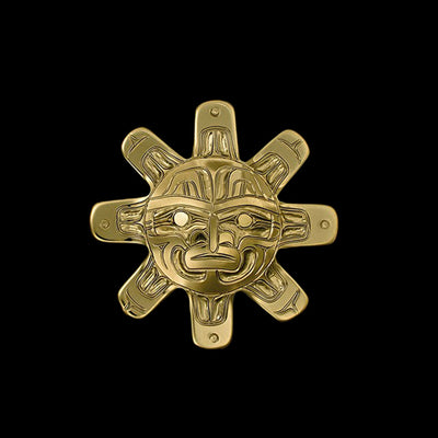 This sun pendant has the face of a sun looking straight ahead with 8 sun rays.