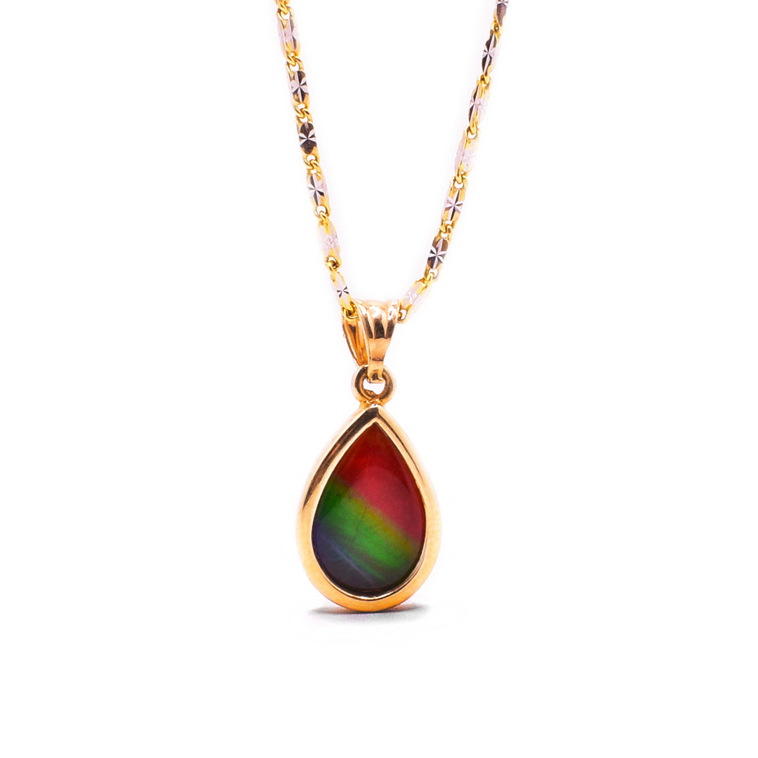 Secondary photo shows the pendant hanging from a gold chain.