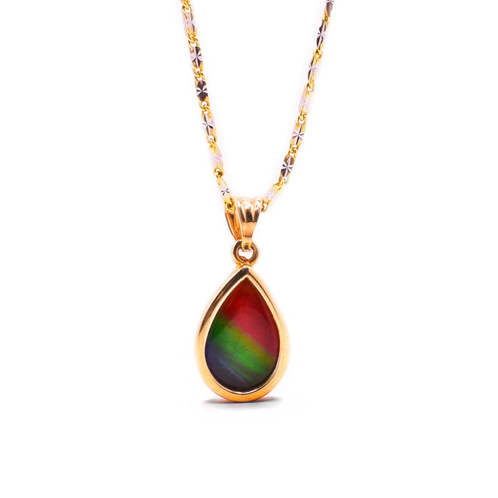 Secondary photo shows the pendant hanging from a gold chain.