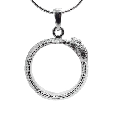 This ouroboros pendant is made from sterling silver and is shaped like a hoop. The piece is shaped like a snake holding its tail in its mouth and there are scale designs made all around it. The details of the head are also including with the mouth and eyes.