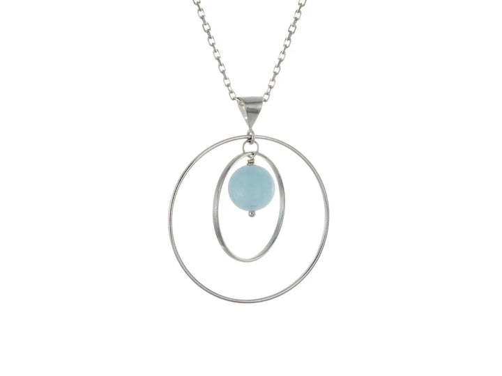This aquamarine necklace has a large sterling silver hoop with a smaller hoop in the middle of it and a sphere shaped aquamarine bead in the center of them. All of these pieces are suspended and can orbit around each other.