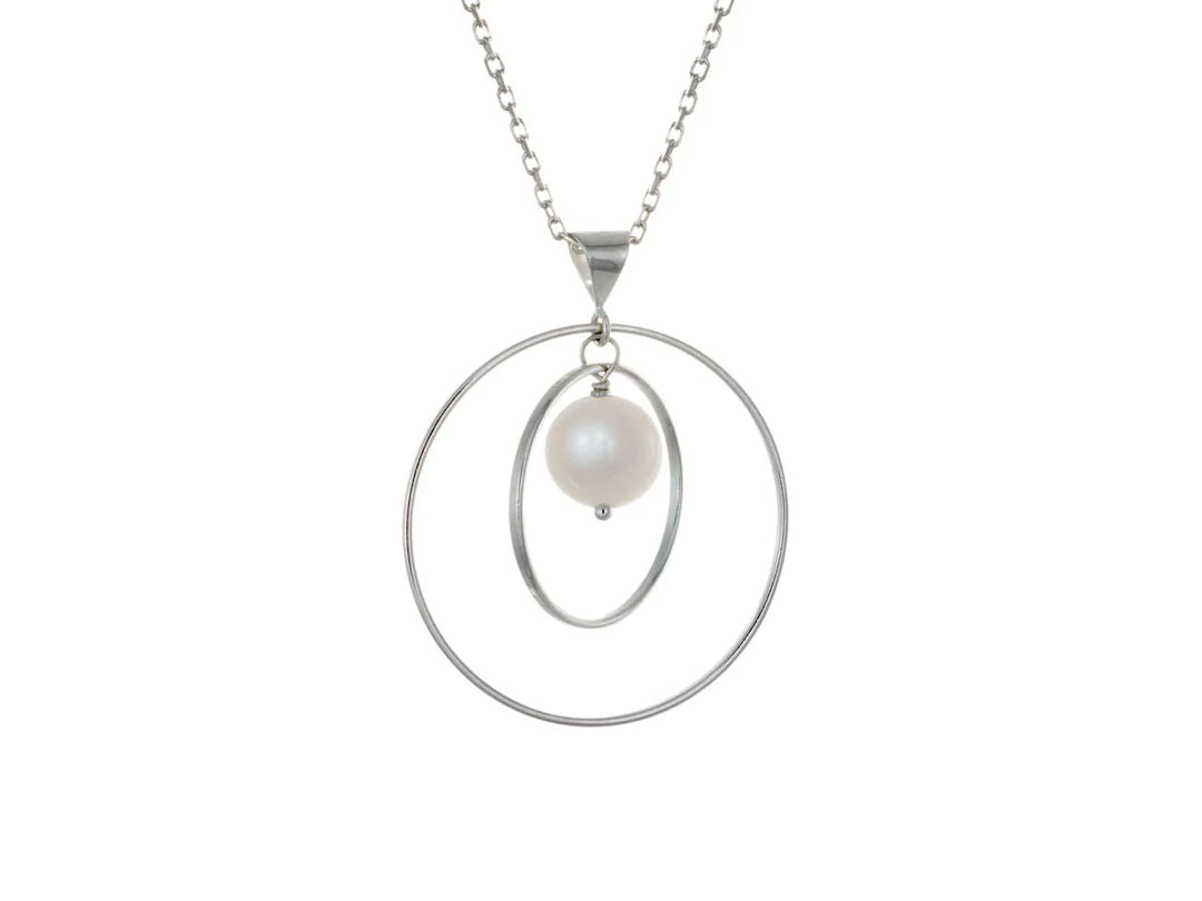 This white pearl necklace has a large sterling silver hoop with a smaller hoop in the middle of it and a sphere shaped white pearl bead in the center of them. All of these pieces are suspended and can orbit around each other.