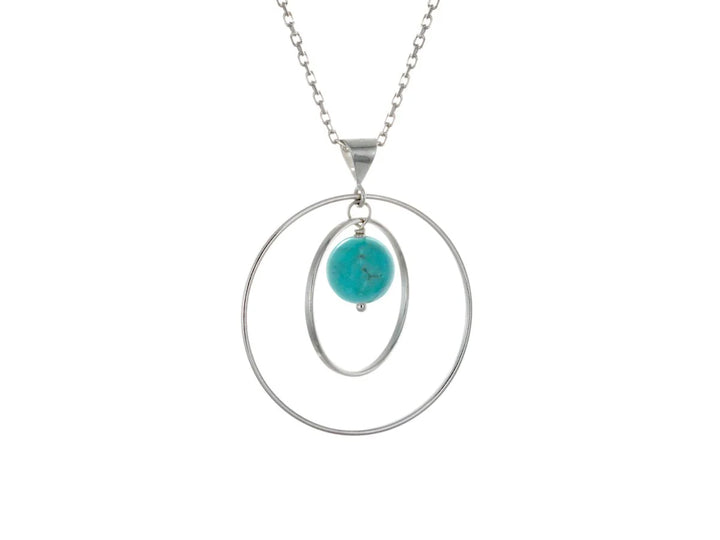 This turquoise necklace has a large sterling silver hoop with a smaller hoop in the middle of it and a sphere shaped turquoise bead in the center of them. All of these pieces are suspended and can orbit around each other.