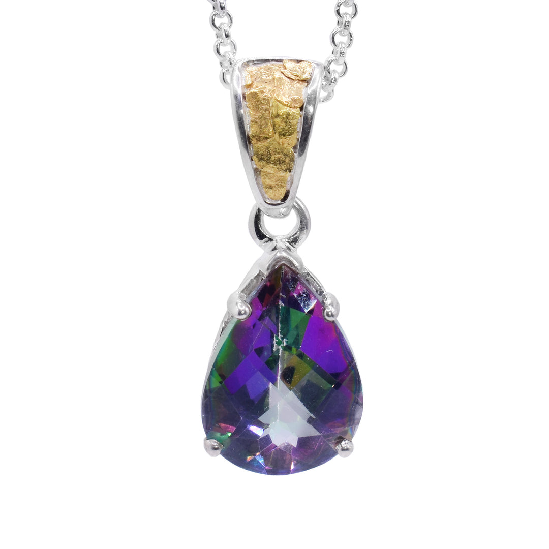This blue topaz gold pendant is pear shaped and includes the colours pink, green, light blue, and purple. The topaz is held in place by a sterling silver claw setting. The attached bail has 22k yellow gold nuggets on the front.