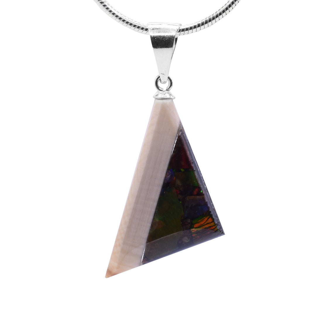 This ammolite pendant is in the shape of a right angle triangle and its half ammolite and half, fossilize mammoth ivory. The inside of the triangle is ammolite and the outside is an ivory strip. The gem has green and red colours.