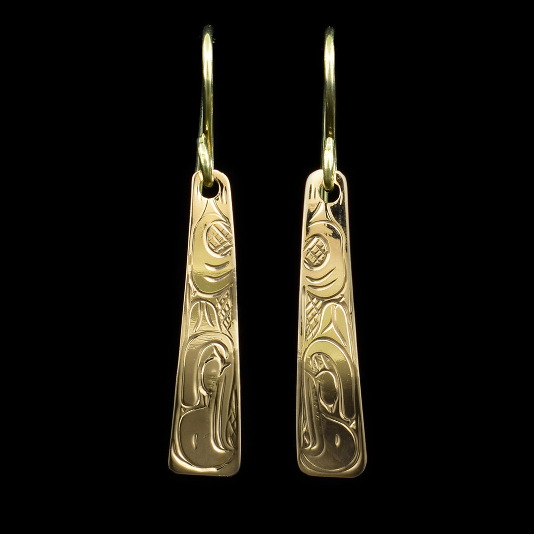 These Eagle earrings are made from 14K gold and the hangs are long, tapered and rounded. There are depictions of the Eagle carved into the surface of the hangs.