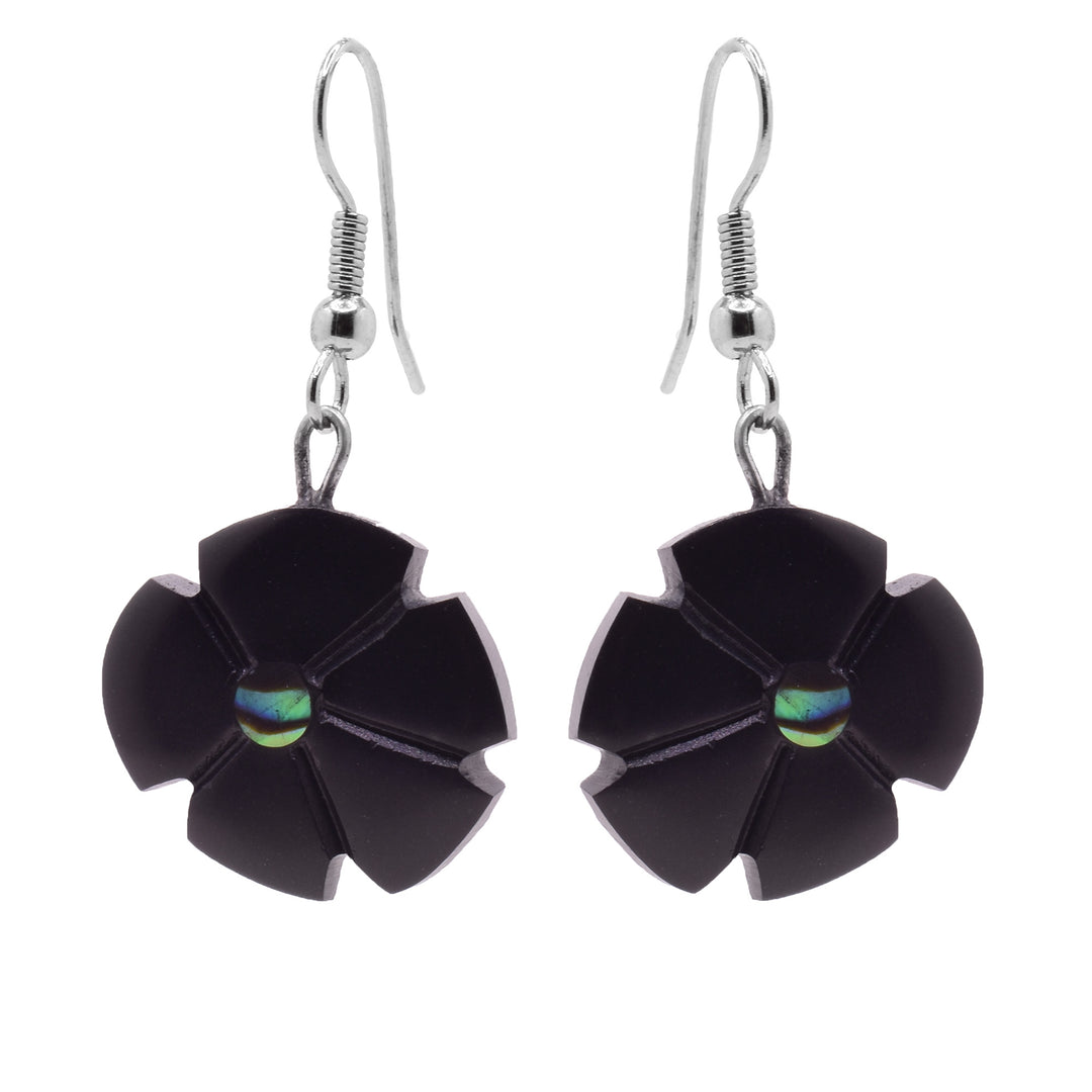 These abalone dangle earrings have large, circle shaped hangs carved from argillite stone. There are four petals detailed with an abalone gem in the center of the flower hangs.