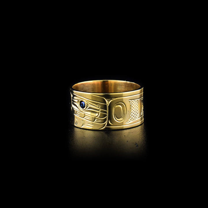 Front and side-view of ring. Eagle’s torso depicted. Done in ovoids, lines and cross-hatching. Sapphire in eye still visible.