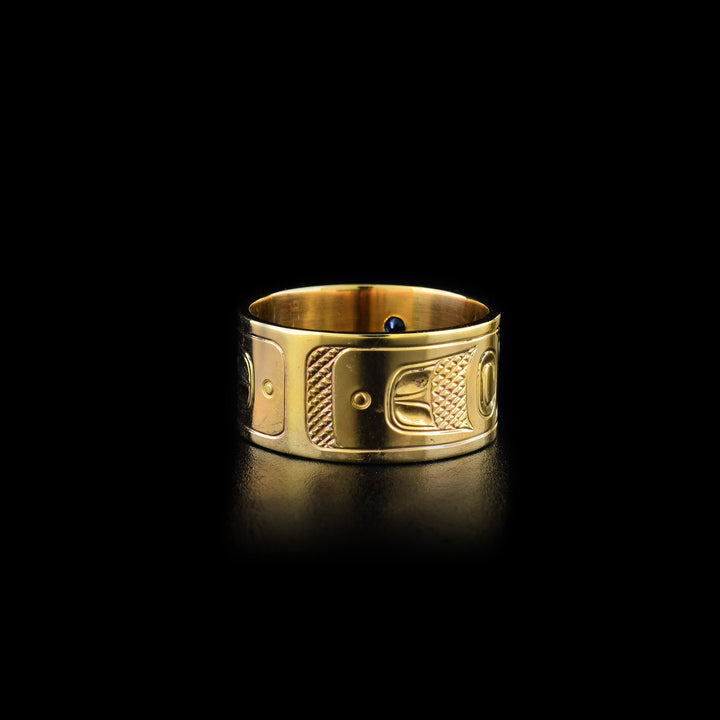 Back of ring. Designs done in ovoids, lines and cross-hatching.