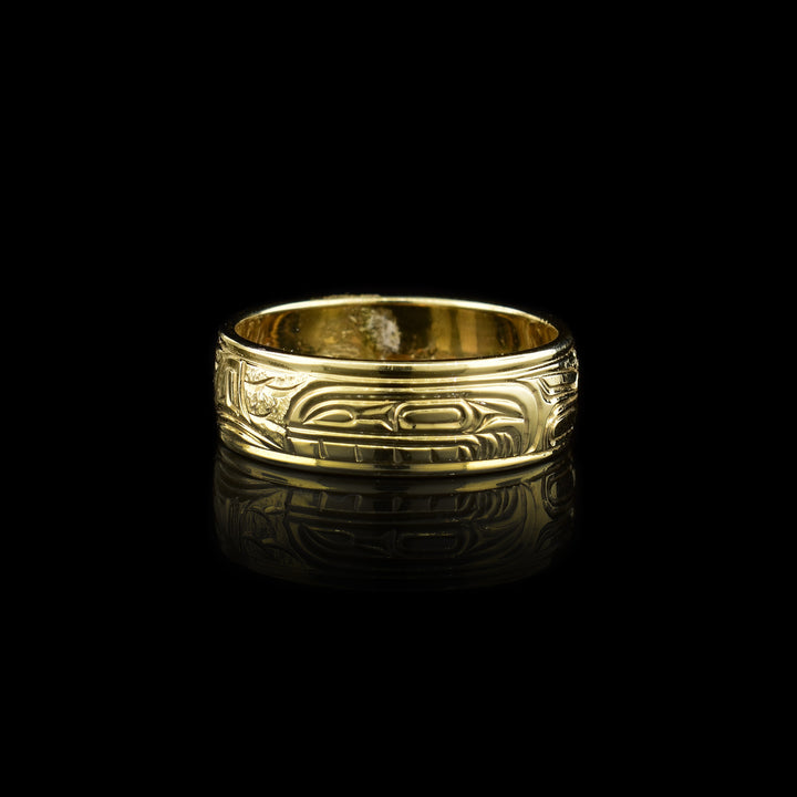 14K Gold Orca Ring, the indigenous carving of the orca legend wraps around the band of this gold ring.