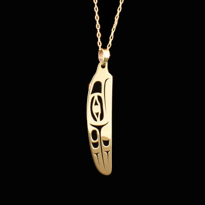 14K gold feather pendant with laser-cut eagle design. By Tahltan artist Grant Pauls.