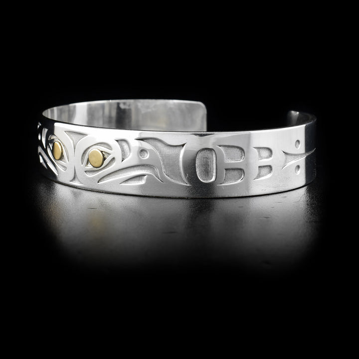 Left side featuring laser-carved designs.