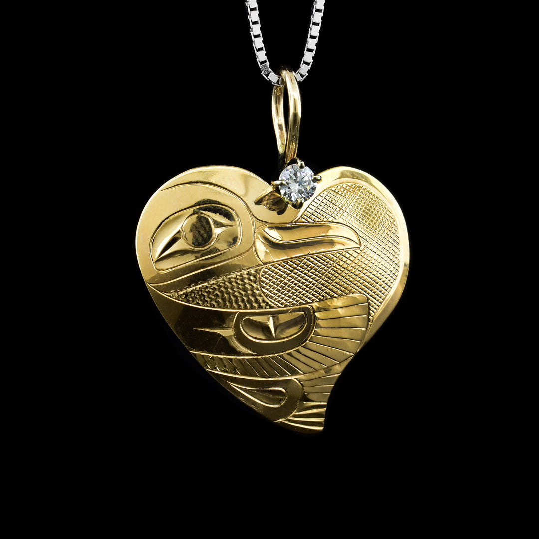 14k Gold Heart Hummingbird Pendant With Diamond, is indigenous carved by Fred Myra and is sold by Artina's Jewellery in Victoria BC