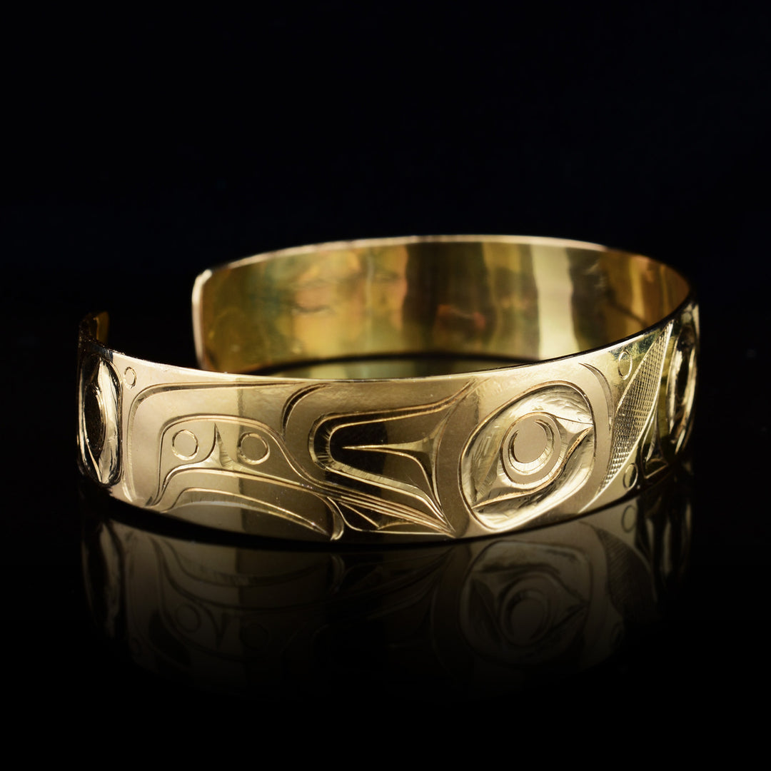Right side of the gold cuff bracelet depicts the beautiful wing of the Hummingbird.