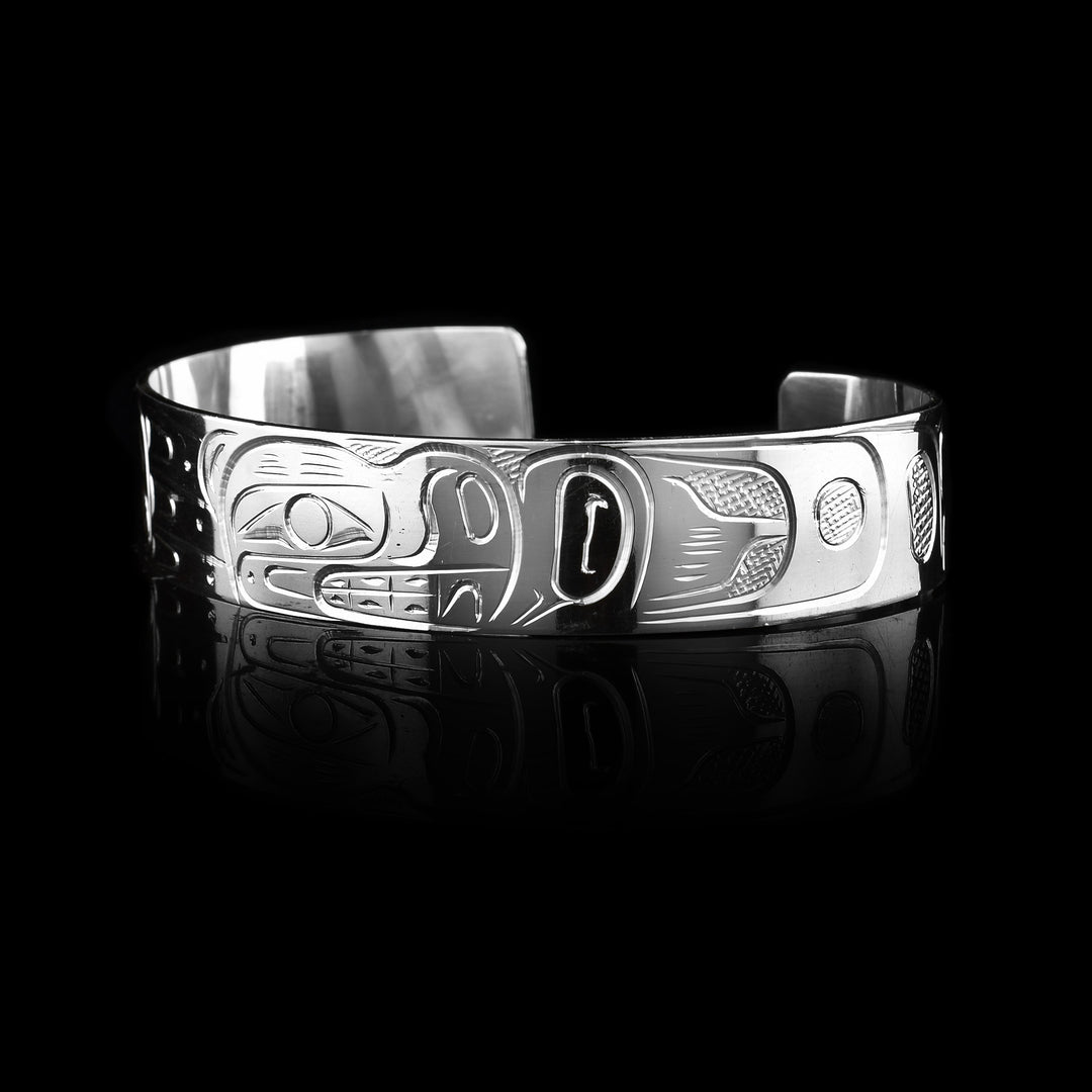 This 1/2" Sterling Silver Bear Cuff Bracelet is sold at artina's and made with care and culture.