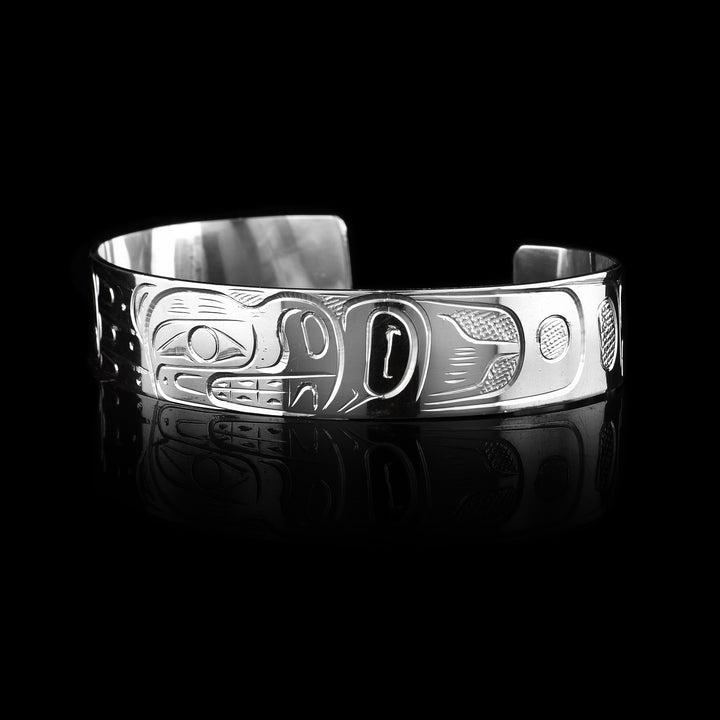This 1/2" Sterling Silver Bear Cuff Bracelet is sold at artina's and made with care and culture.