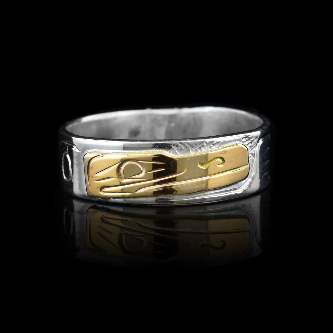 1/4" Silver & 14k Gold Raven Band Ring, the Ravens face is made out of the 14k gold while the rest of the band is sterling silver with detail carving of the indigenous Raven legend.