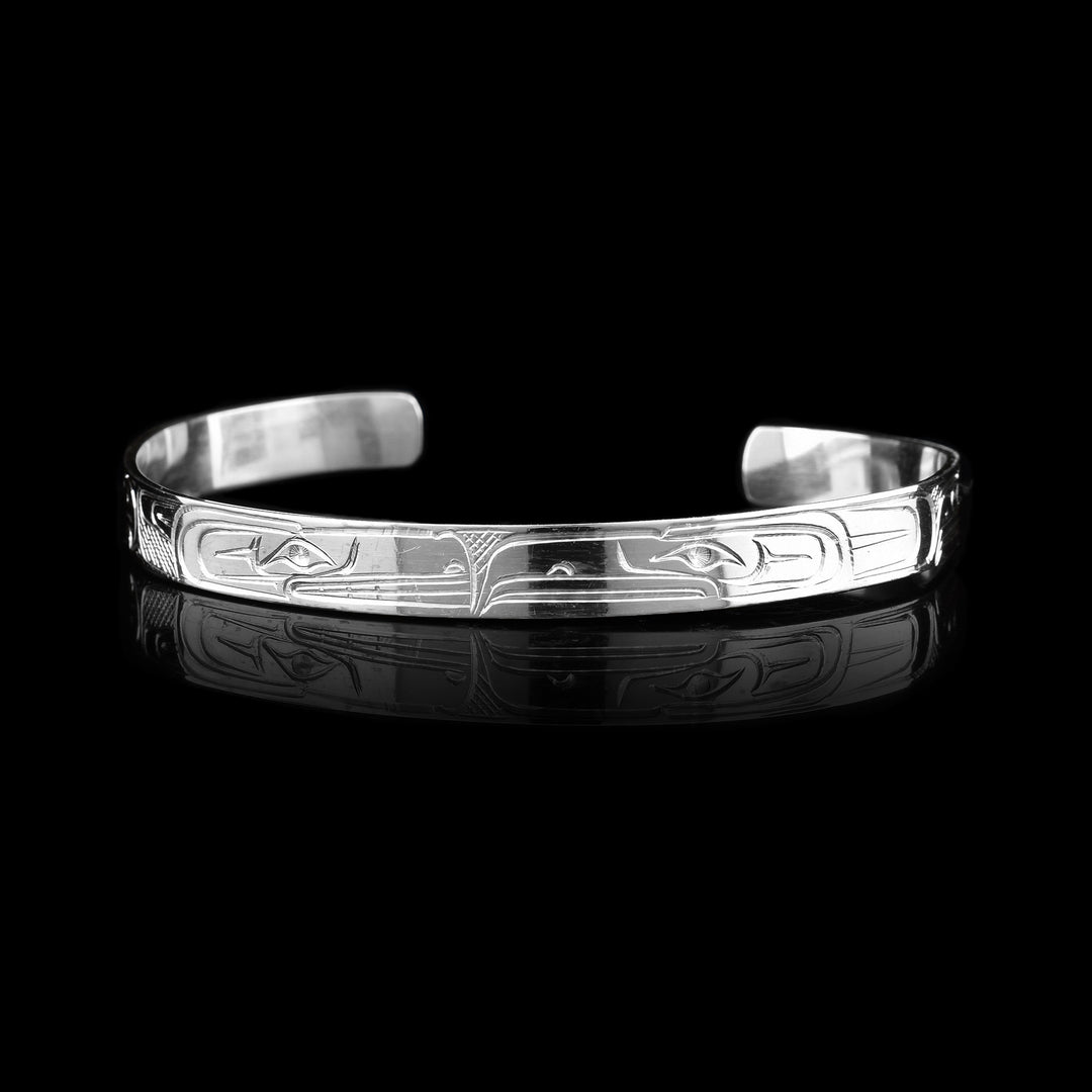 1/4" Sterling Silver Trippel Bird with Wolf Bracelet, Raven, Eagle, and Thunderbird are etched into the bracelets surface.