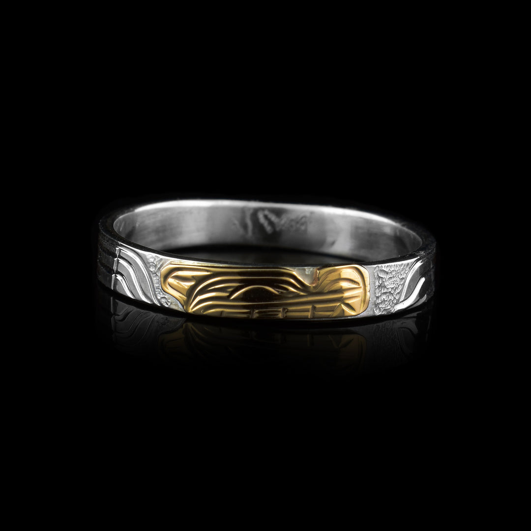 Sterling silver band ring featuring a gold wolf design with engraved detailing and a smooth, comfortable fit.