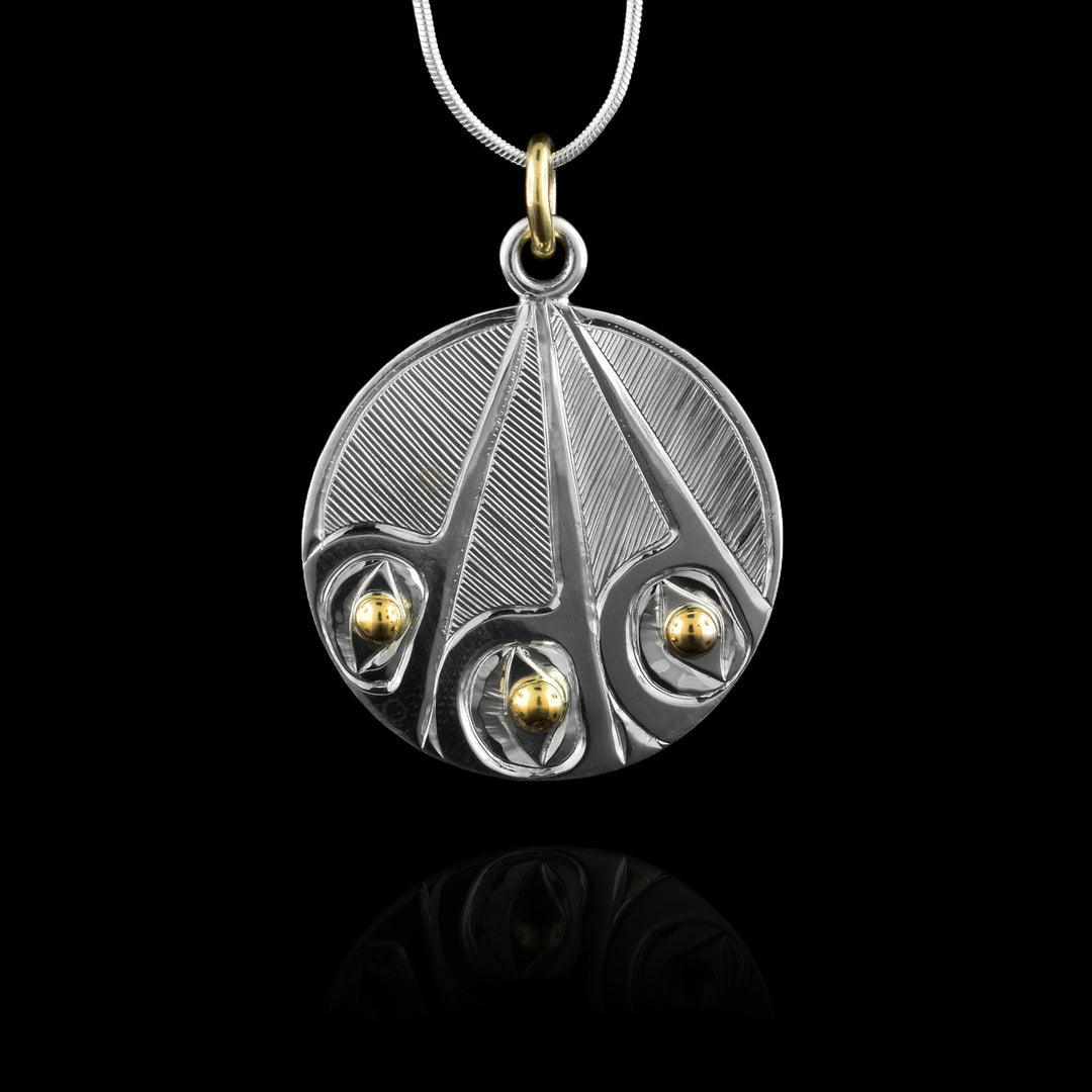 1" Silver and Gold Hummingbird Circle Pendant. Three Hummingbird heads together point up towards the bail.
