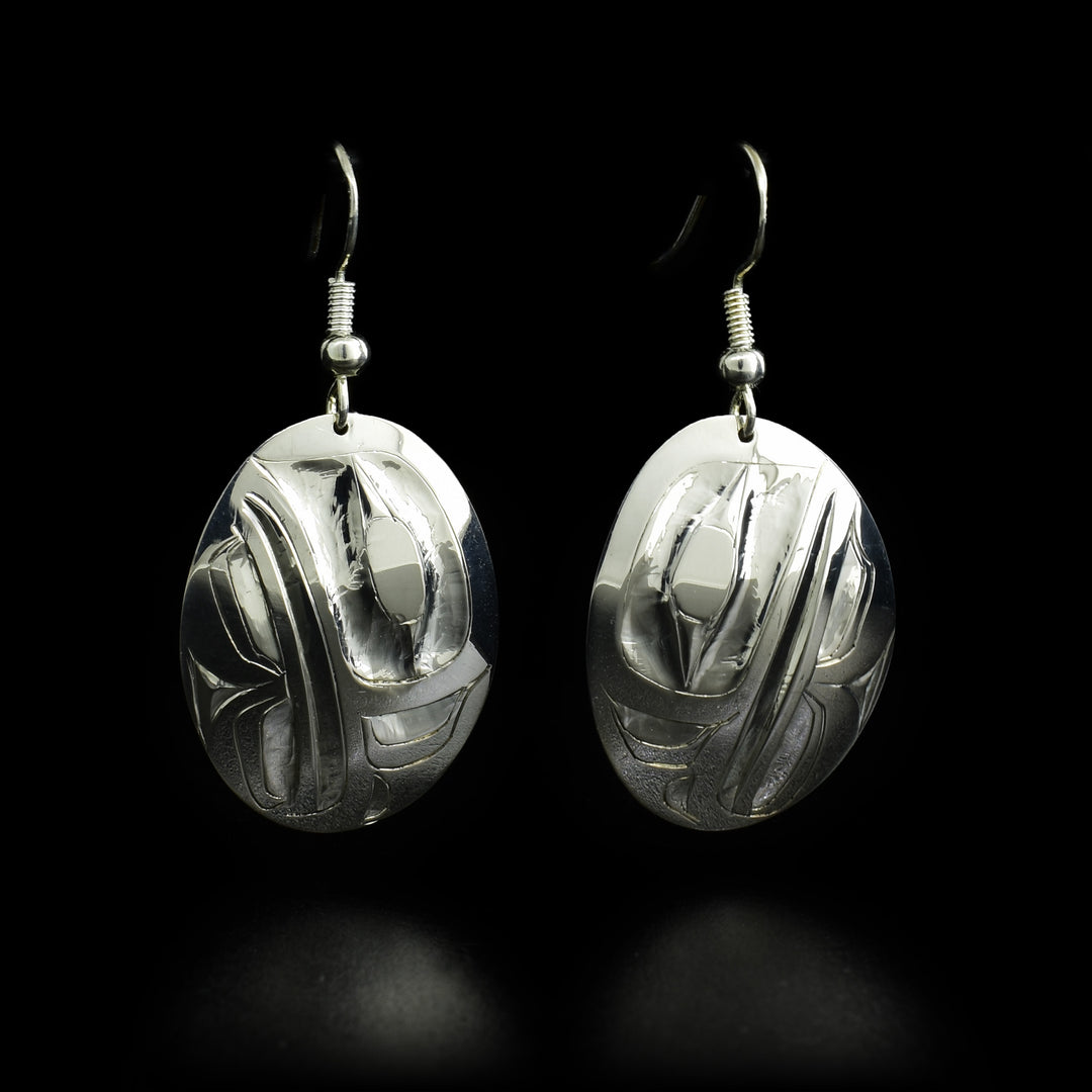 These earrings are made out of sterling silver and hold the shape of an Eagle. They measure 1 1/2" x 3/4" including the hook. 