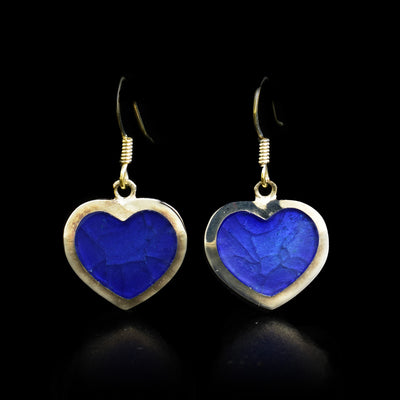 These enamel and fine silver hook earrings  are heart shaped. The hearts are blue.
