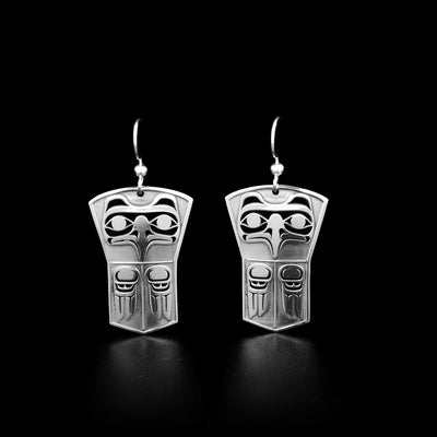 Sterling silver shield shaped earrings depicting the Eagle's head and wings. By Grant Pauls.