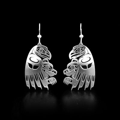 These sterling silver earring have the shape of the Eagle with the Wolf under the Eagle. 