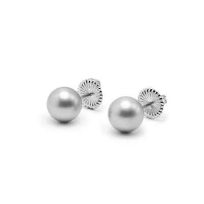 These pearl earrings studs have silver pearls that are round and backed with studs.