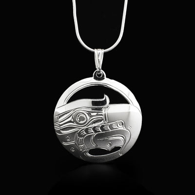This round sterling silver pendant depicts the Eagle's head.