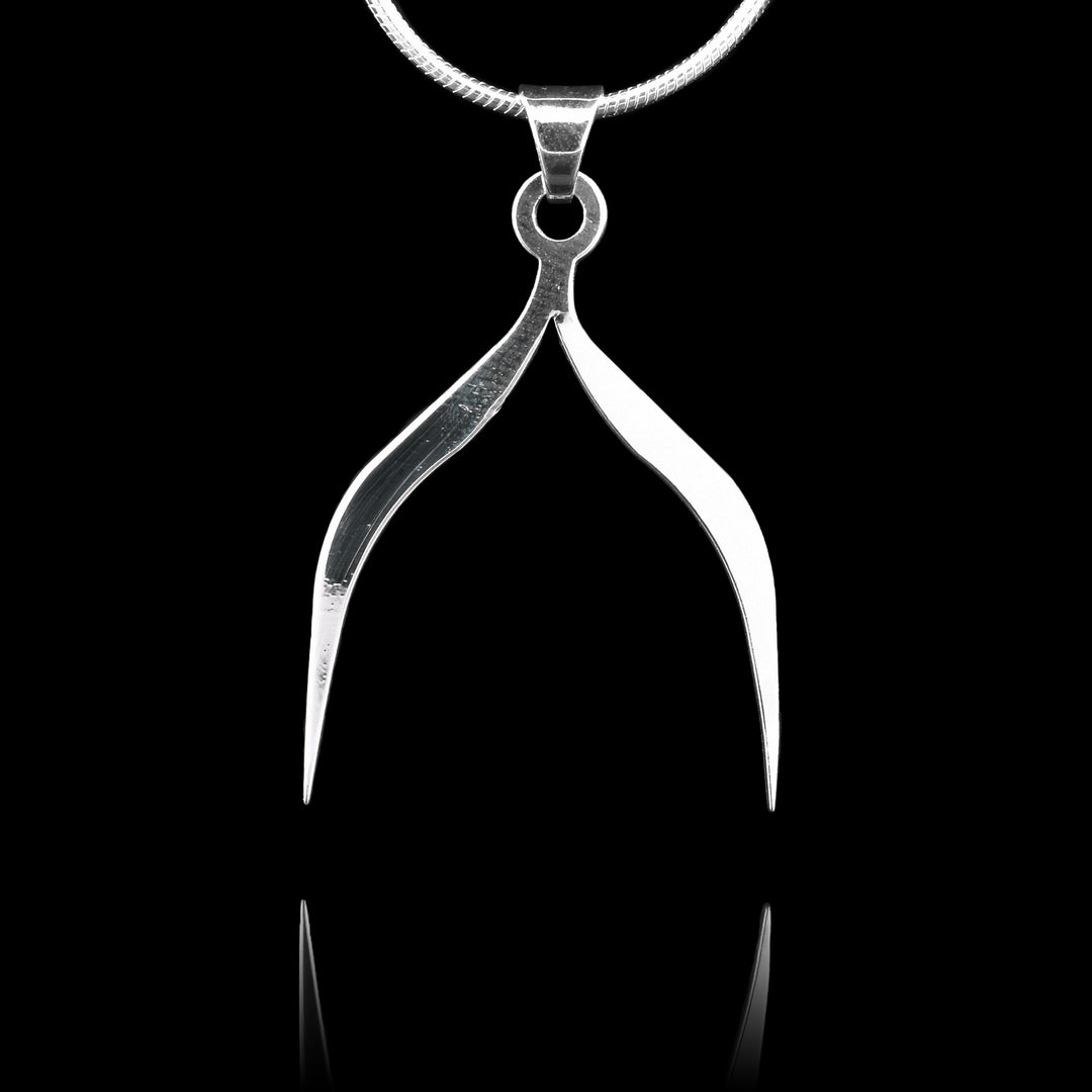 These sterling silver pendants split from the top and have two, thin pieces that spread apart and drop down to form a wish-bone like shape. The pendants depict a Haida Gwaii character.
