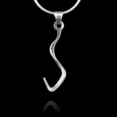 These sterling silver pendants drop down in a zig zag motion and curves up to form a hook at the very bottom. The pendants depict a Haida Gwaii character.
