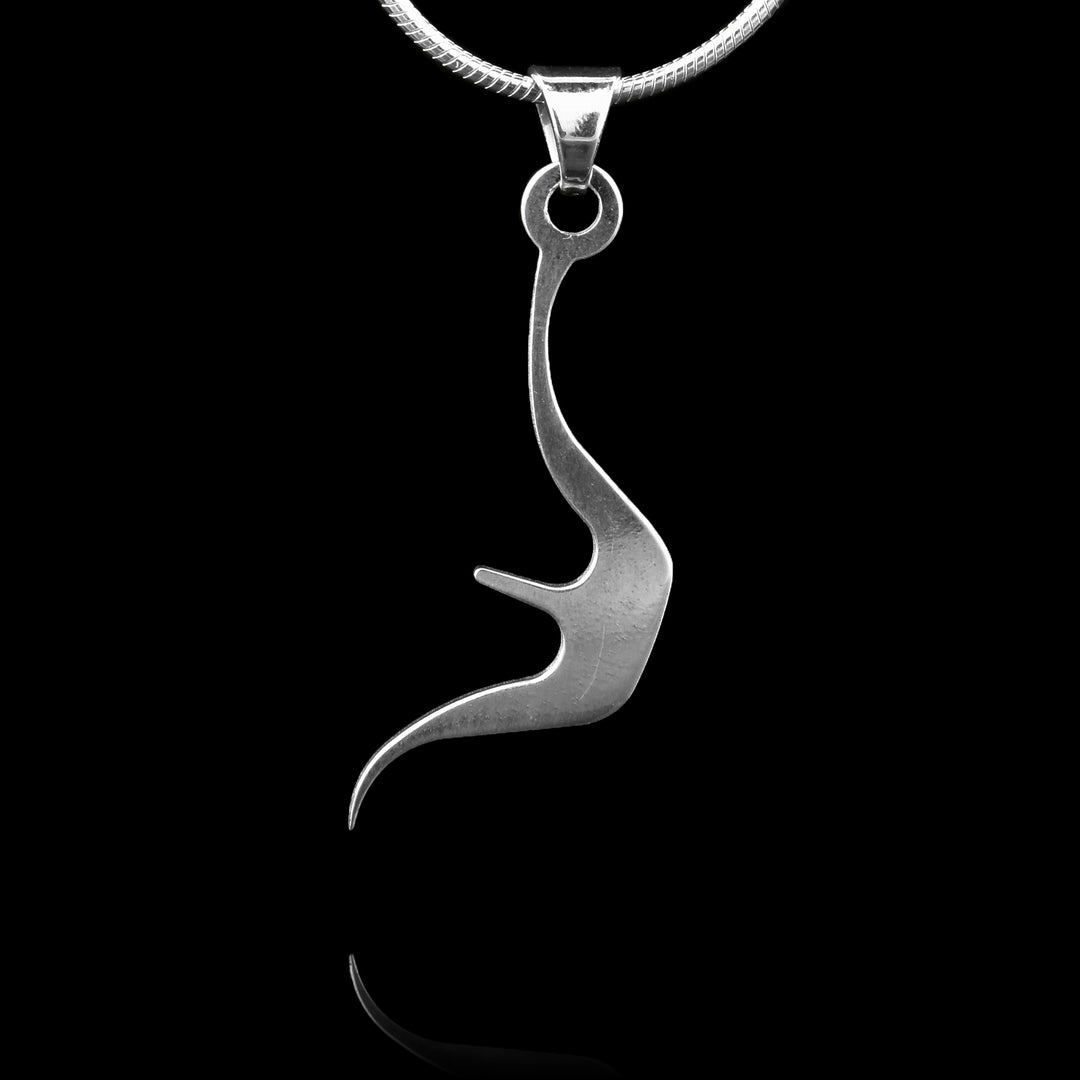 These sterling silver pendants drop down, have a wide curve in the middle and a small arm reaching out to the side from the center. The bottom of the piece curves back. These pendants depict a Haida Gwaii character.