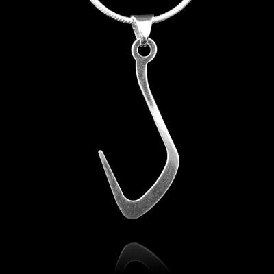 These sterling silver pendants drop down and curve up to form a shape hook shape. The piece depicts a Haida Gwaii character.