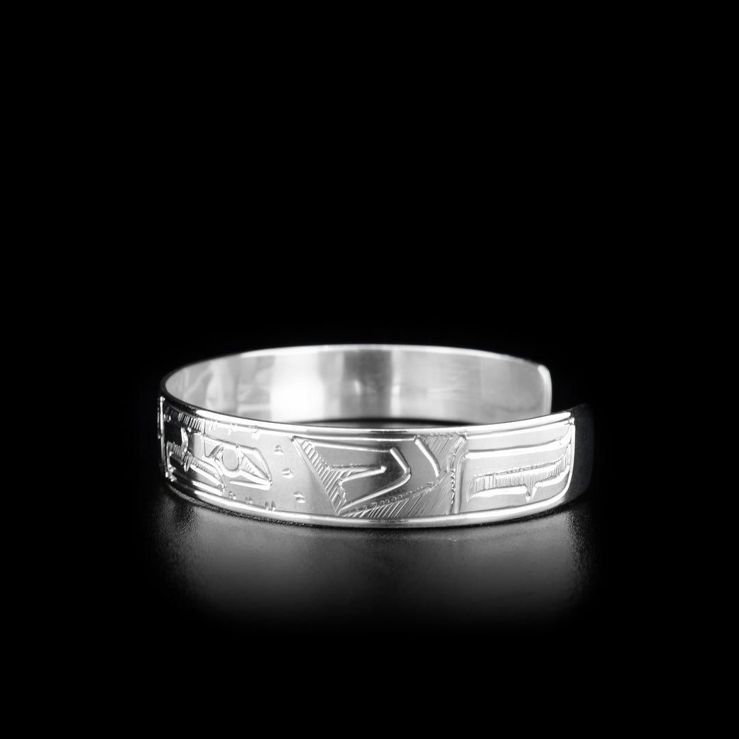 This Eagle and Sun bracelet is made from sterling silver and has two depictions of the Eagle and a depiction of the Sun carved into the surface of the cuff bracelet.