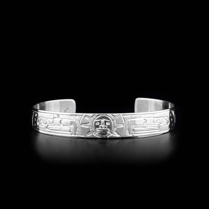This Eagle and Sun bracelet is made from sterling silver and has two depictions of the Eagle and a depiction of the Sun carved into the surface of the cuff bracelet.