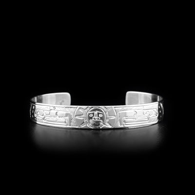 This Eagle and Sun bracelet is made from sterling silver and has two depictions of the Eagle and a depiction of the Sun carved into the surface of the cuff bracelet.