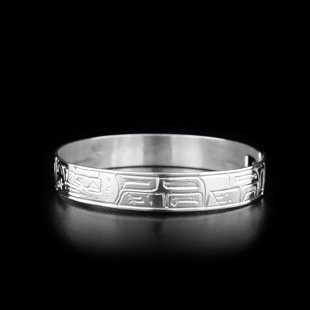 This silver clasp bracelet has two depictions of the Wolf and a depiction of the Sun. The Wolves are depicted facing the Sun at the top of the band.