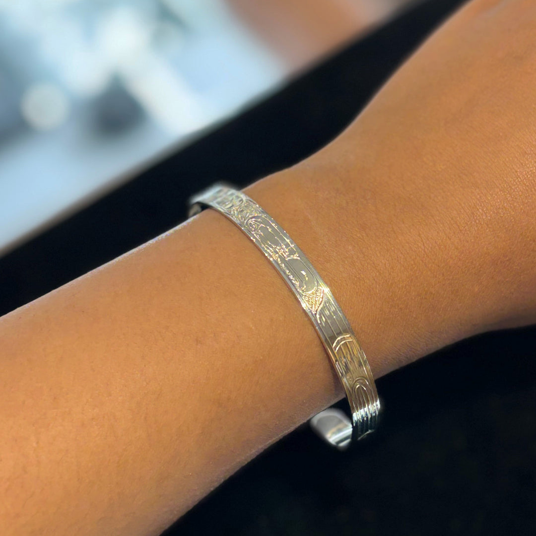 This photo shows the eagle bracelet on a female wrist.